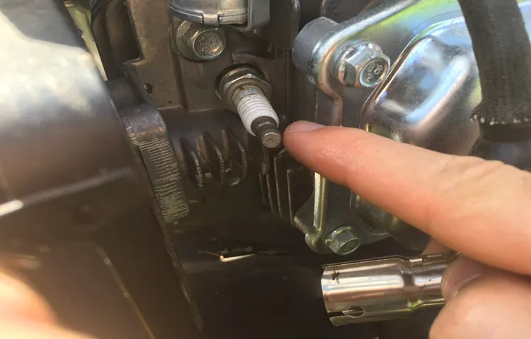 how to change a spark plug on a riding lawn mower