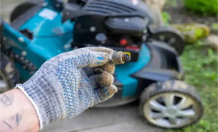 how to change spark plug on lawn mower
