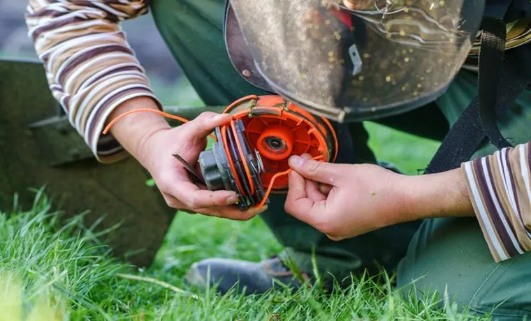 how to change troy bilt weed eater string