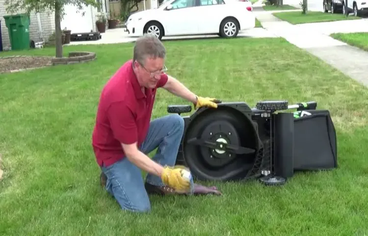 how to clean under lawn mower deck