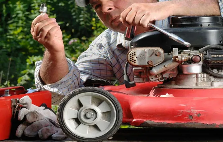 how to get spark plug out of lawn mower
