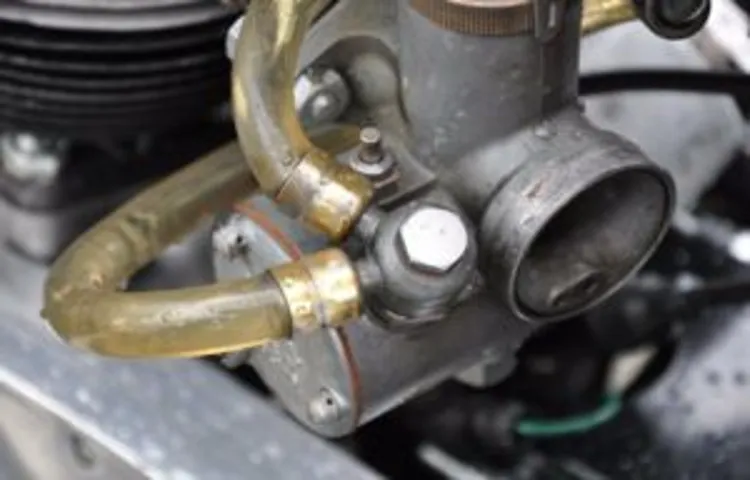 how to get water out of lawn mower carburetor