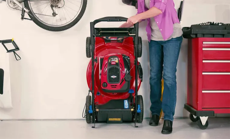 how to hang a lawn mower on the wall