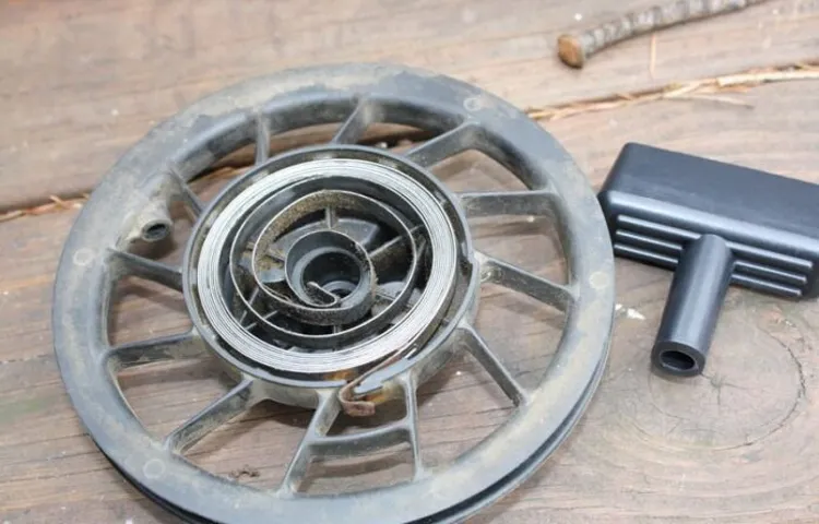 how to recoil a lawn mower spring