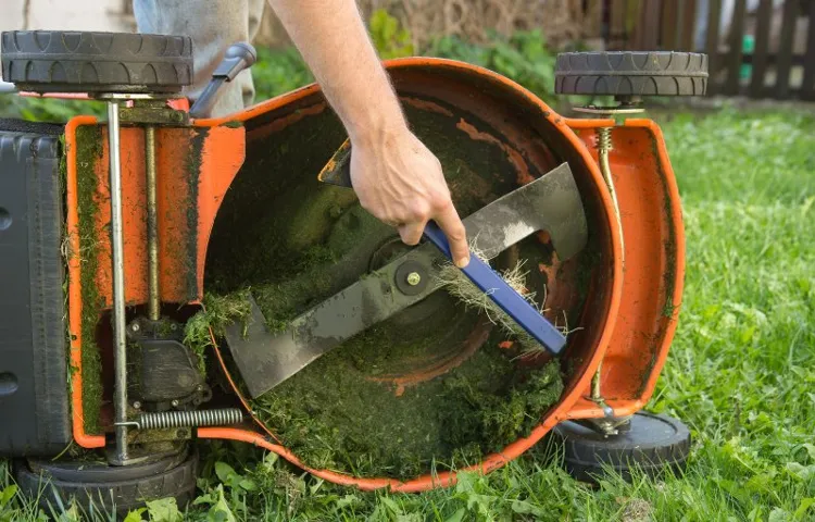 how to remove dried grass from lawn mower deck