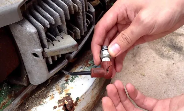 how to replace a spark plug on a lawn mower