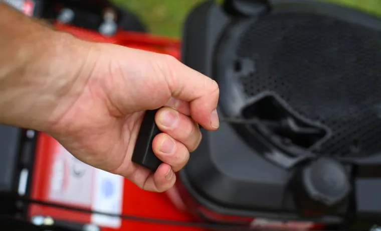why lawn mower pull cord is stuck