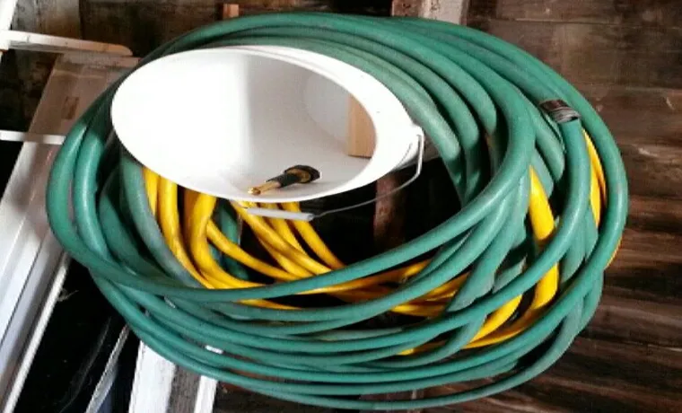 a garden hose fills a 2 gallon bucket