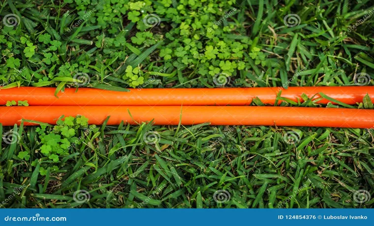 a bright orange garden hose