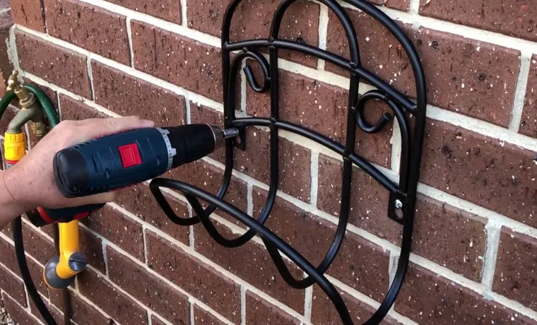 how to attach garden hose reel to brick house