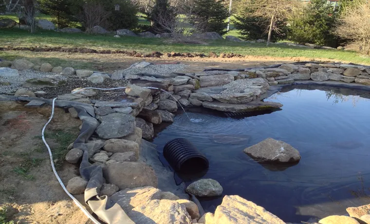 how to attach pond liner to wall