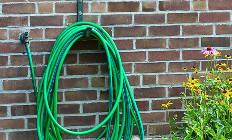 how to keep garden hose off grass